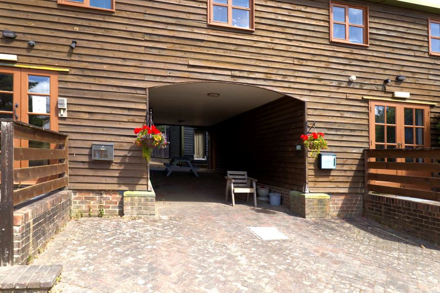 Archway entrance to the courtyard at Monkhurst House