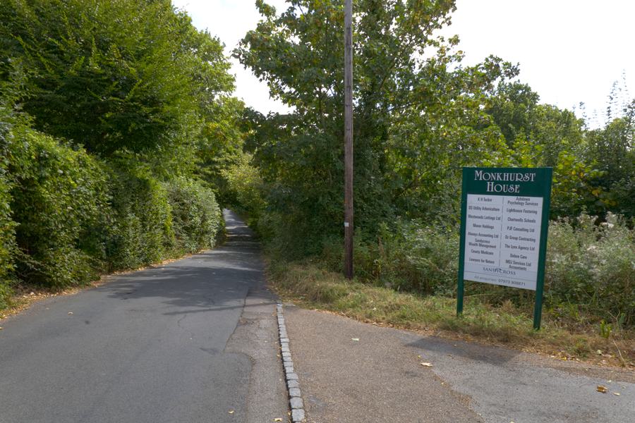 Monkhurst House sign at the entrance off Sandy Cross Lane